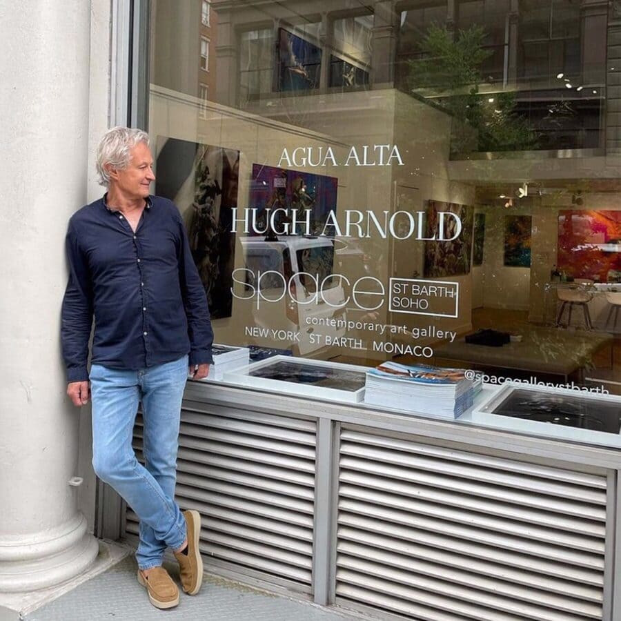 Hugh Arnold in front of gallery