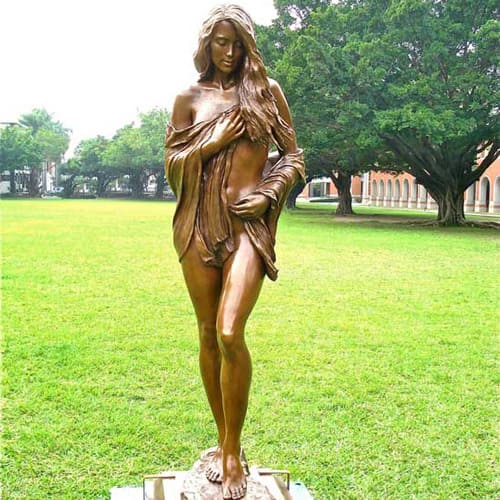 Bronze female sculpture draped in cloth